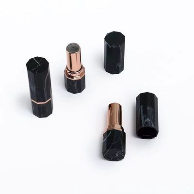 Luxe zwarte marmeren patroon achthoekige lippenstift tube container met roségouden accent
