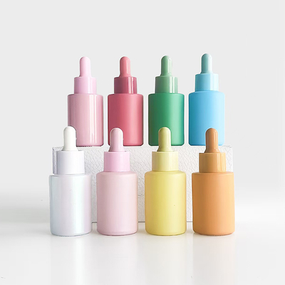 Macaronkleur essentiële olie fles van 30 ml met plastic PP pomp en glazen materiaal