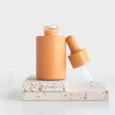 Macaronkleur essentiële olie fles van 30 ml met plastic PP pomp en glazen materiaal