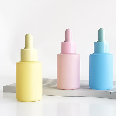 Macaronkleur essentiële olie fles van 30 ml met plastic PP pomp en glazen materiaal