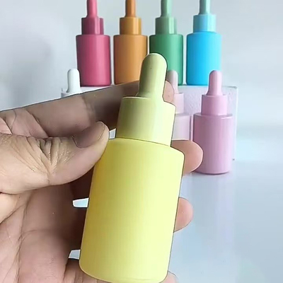 Macaronkleur essentiële olie fles van 30 ml met plastic PP pomp en glazen materiaal