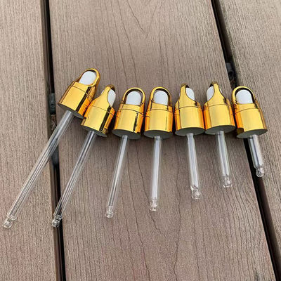 Doorzichtige glazen dropperfles met gouden dop