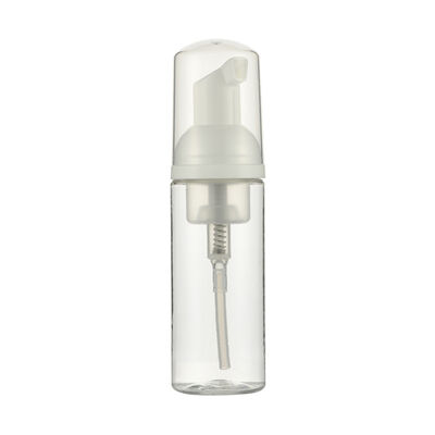 Witte schuimpomp dispenser met heldere beschermende dop voor cosmetische flessen
