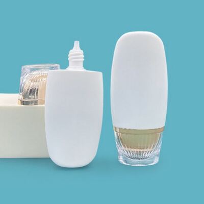 Customl Oval Shaped Luxury Gold Sunscreen Bottle High-End  Cosmetic Packaging  Lotion and Skincare