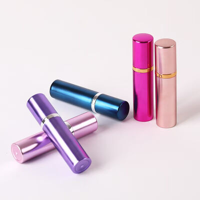 Luxe roze aluminium draagbare parfumspuitfles met metalen ring